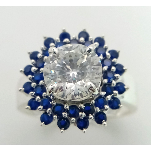 902 - A 1.75ct White Moissanite Ring set in 925 Silver. Brilliant round cut moissanite with a double blue ... 