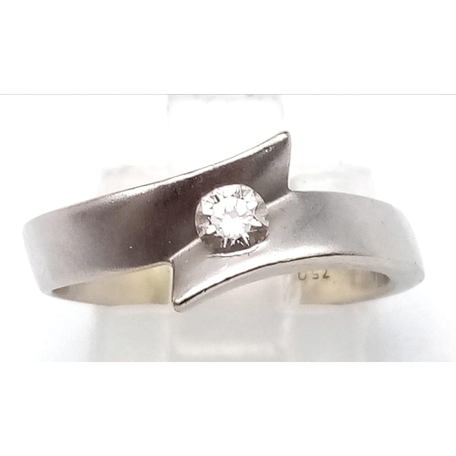 102 - An 18K White Gold Solitaire Diamond Crossover Ring. Size L.
5.2g total weight. Brilliant round cut d... 