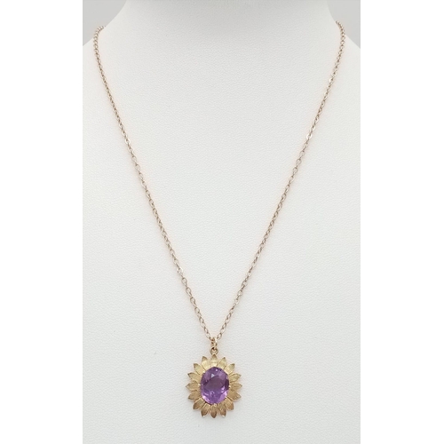 535 - A 9K Yellow Gold Amethyst Flower Pendant on a 9K Yellow gold Disappearing Necklace. Lovely, clean fa... 