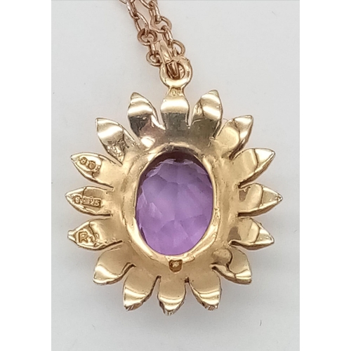 535 - A 9K Yellow Gold Amethyst Flower Pendant on a 9K Yellow gold Disappearing Necklace. Lovely, clean fa... 