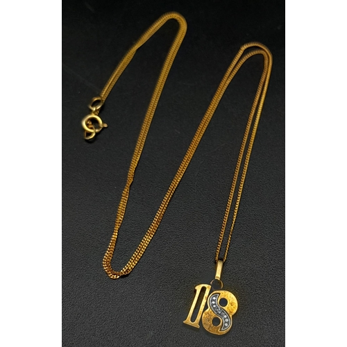 547 - A 9k Yellow Gold '18' Pendant on a 9K Yellow Gold Disappearing Necklace. Single small diamond on 8. ... 