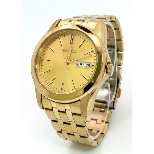 634 - A Vintage Seiko Gold Plated Quartz Gents Watch. GP strap and case -38mm. Gold tone dial with day/dat... 