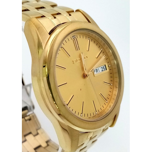 634 - A Vintage Seiko Gold Plated Quartz Gents Watch. GP strap and case -38mm. Gold tone dial with day/dat... 