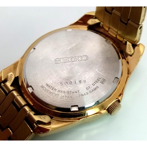 634 - A Vintage Seiko Gold Plated Quartz Gents Watch. GP strap and case -38mm. Gold tone dial with day/dat... 