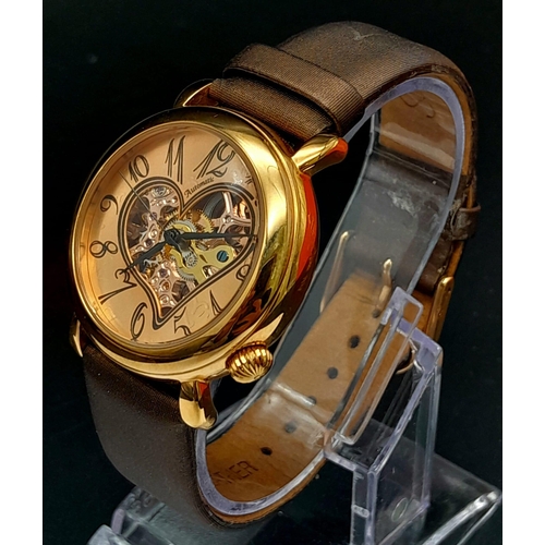 710 - A Stuhrling Skeleton Heart-Decorative Automatic Watch. Brown leather strap. Gilded case - 35mm. Rose... 