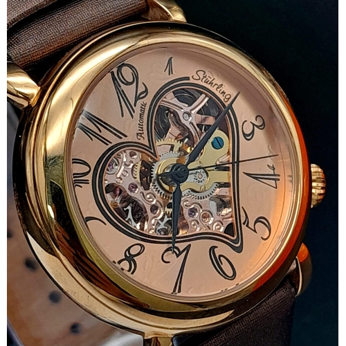 710 - A Stuhrling Skeleton Heart-Decorative Automatic Watch. Brown leather strap. Gilded case - 35mm. Rose... 