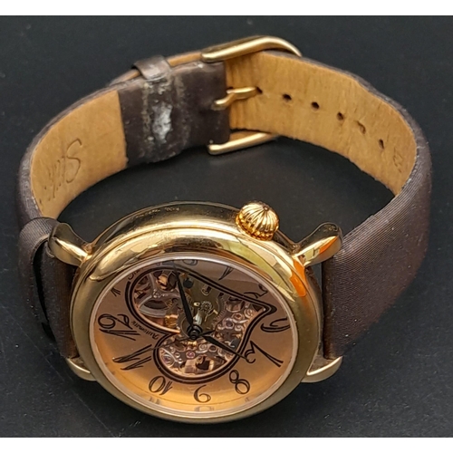 710 - A Stuhrling Skeleton Heart-Decorative Automatic Watch. Brown leather strap. Gilded case - 35mm. Rose... 