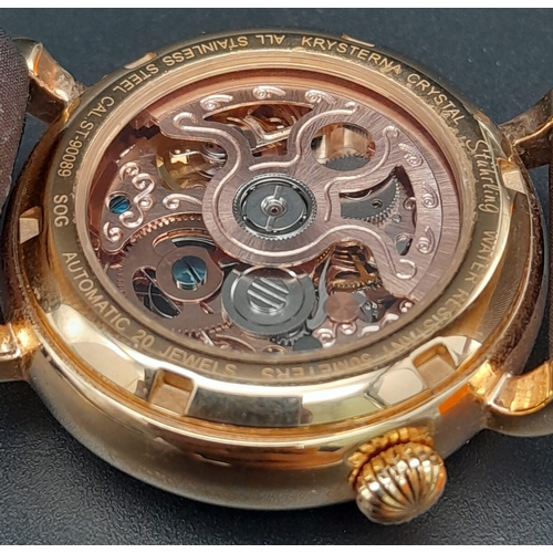 710 - A Stuhrling Skeleton Heart-Decorative Automatic Watch. Brown leather strap. Gilded case - 35mm. Rose... 