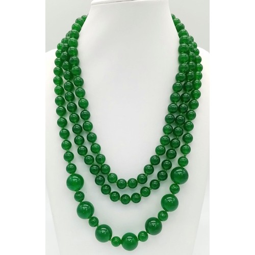 577 - A Rope Length Green Jade Necklace with Different Sized Jade Beads - 8mm and 14mm. Necklace length - ... 