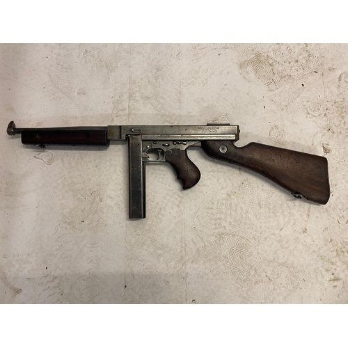 101 - A Deactivated Thompson Submachine Gun. Rear moving bolt under spring pressure. 11 inch barrel length... 