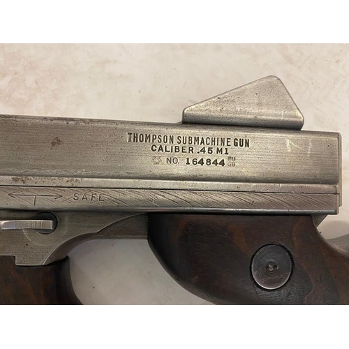 101 - A Deactivated Thompson Submachine Gun. Rear moving bolt under spring pressure. 11 inch barrel length... 