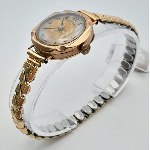 136 - A Vintage 9K Gold Ladies Watch. Expandable gilded bracelet. 9K gold case - 26mm. Gilded dial with ou... 