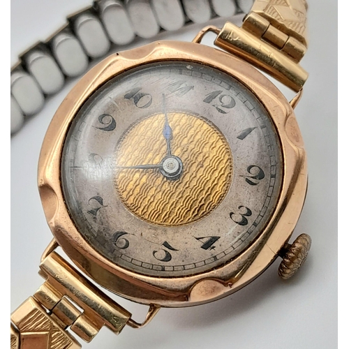 136 - A Vintage 9K Gold Ladies Watch. Expandable gilded bracelet. 9K gold case - 26mm. Gilded dial with ou... 