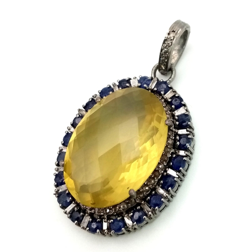 163 - A Lemon Quartz, Sapphire and Rose Cut Diamond Pendant.  Large faceted lemon quartz with a halo of di... 