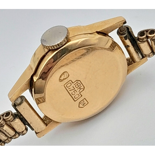 430 - A Vintage 18K Gold Cased Mudo Ladies Watch. Rolled gold bracelet. 18k gold case. Mechanical movement... 