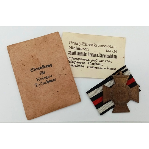 446 - WW1 Imperial German Honour Cross Medal in the original packet. Found inside a hand carved, hand pain... 