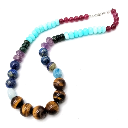 472 - A Multi-Gemstone Beaded Necklace - Lapis, amethyst, tigers eye, jade and aquamarine. Rondelle and ro... 