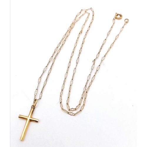 515 - A 9K Yellow Gold Cross Pendant on a 9K Yellow Gold Necklace. 25mm and 52cm. 2.26g total weight