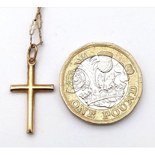 515 - A 9K Yellow Gold Cross Pendant on a 9K Yellow Gold Necklace. 25mm and 52cm. 2.26g total weight