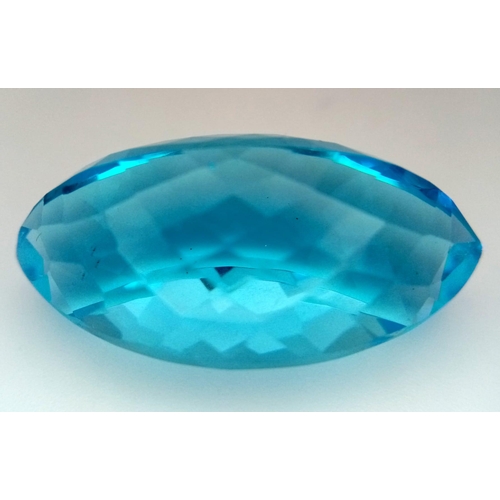 605 - A Large 61ct Lab Created Oval Cut Blue Topaz. Well faceted with, clean, with no marks or inclusions.... 