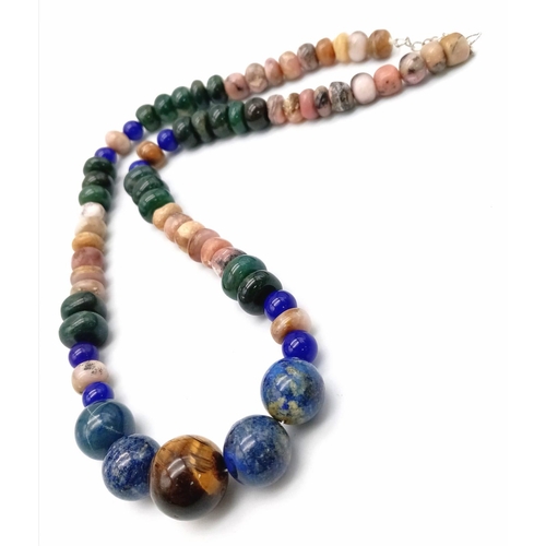 612 - A Tigers Eye, Jade and Lapis Lazuli Necklace. A mixture of rondelle and round beads. Largest central... 