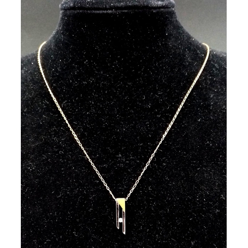 624 - A 9K White and Yellow Gold Diamond Set Pendant on a 9K Yellow Gold Disappearing Necklace. 20mm and 4... 