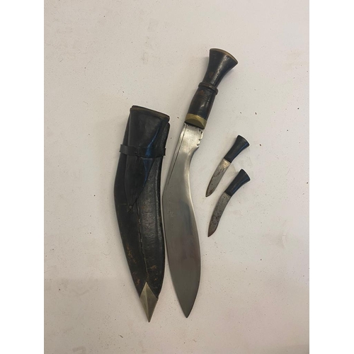 627 - A Vintage Gurka Kukri Knife with Scabbard and the Karda and Chakmak Blades. The smaller blades are u... 