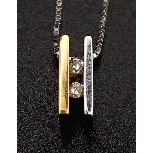 853 - A 9K Yellow and White Gold Twin Diamond Pendant on a 9K White Gold Disappearing Necklace. 10mm and 4... 