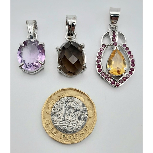 940 - Six Gemstone 925 Silver Pendants. Citrine, Amethyst, Garnet, Quartz x 3 (2 x lemon and 1 smoky).