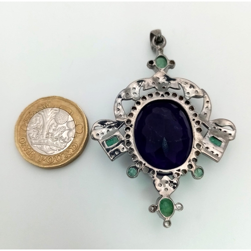 961 - An Art Deco Style Amethyst with Zambian Emeralds & Rose cut Diamond Pendant. Large oval faceted amet... 