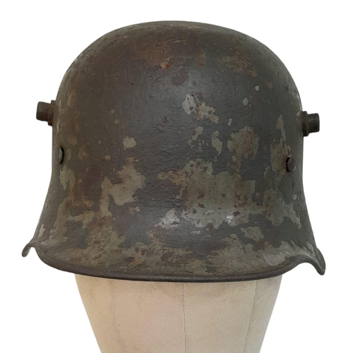 120 - Inter War Period German Friekorps Helmet. A WW1 Imperial German M18 Helmet shell with a 1935 model l... 