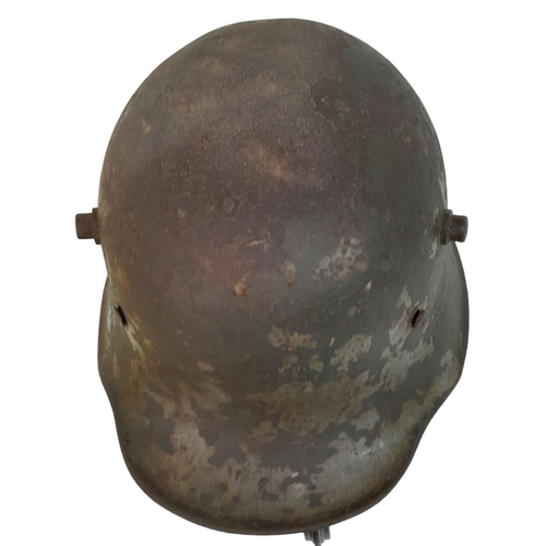 120 - Inter War Period German Friekorps Helmet. A WW1 Imperial German M18 Helmet shell with a 1935 model l... 