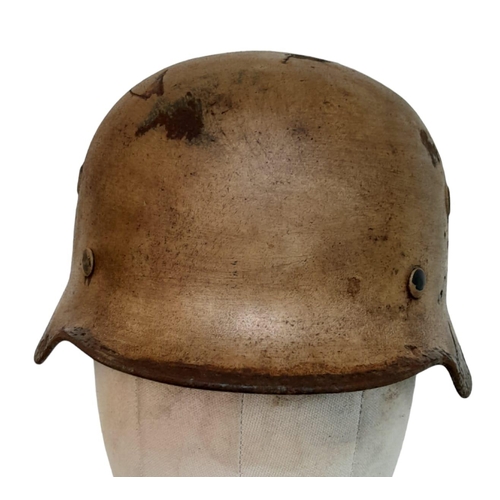 272 - WW2 German Africa Corps M40 Helmet and liner.