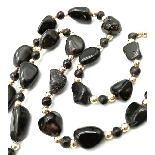 949 - Collection of Black Agate jewellery.

1x Bracelet
1x Earrings
1x Necklace