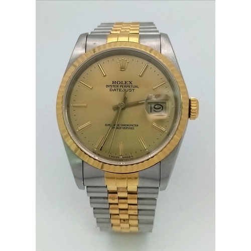 309 - THE CLASSIC GENTS OYSTER PERPETUAL DATEJUST ROLEX WITH GOLDTONE DIAL AND BI-METAL STRAP . A WATCH WE... 