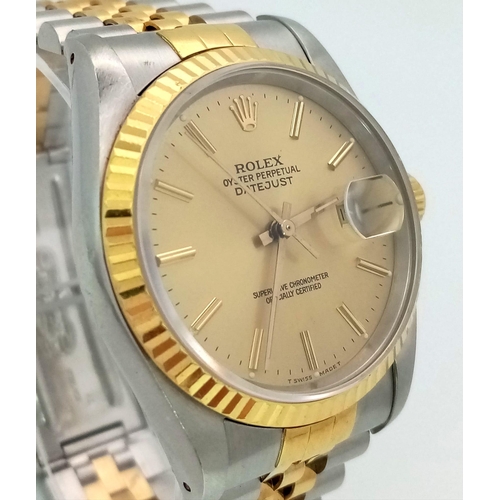 309 - THE CLASSIC GENTS OYSTER PERPETUAL DATEJUST ROLEX WITH GOLDTONE DIAL AND BI-METAL STRAP . A WATCH WE... 