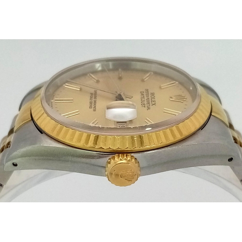 309 - THE CLASSIC GENTS OYSTER PERPETUAL DATEJUST ROLEX WITH GOLDTONE DIAL AND BI-METAL STRAP . A WATCH WE... 