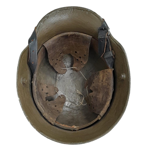 639 - Re-painted WW1 German M-16 Stahlhelm helmet with improvised liner and incorrect chin strap. Ideal st... 