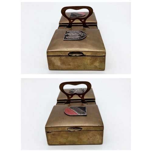 883 - WW2 German Cigarette Box. With Africa Corps Tropical Helmet Badges.