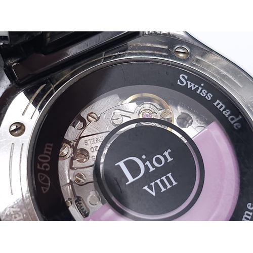 402 - A Christian Dior VIII Black Ceramic and Pink Sapphire Ladies Watch. Ceramic bracelet and case - 34mm... 