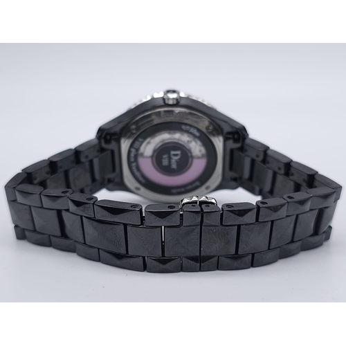 402 - A Christian Dior VIII Black Ceramic and Pink Sapphire Ladies Watch. Ceramic bracelet and case - 34mm... 