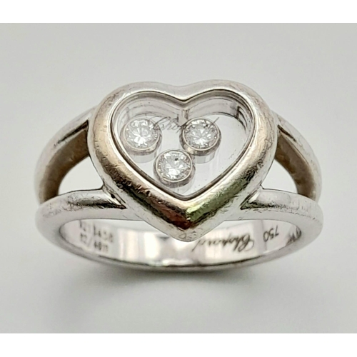 An 18K White Gold Chopard Happy Diamond Ring. Heart shaped with