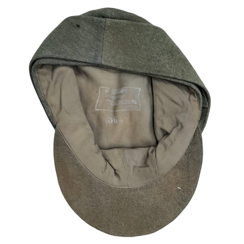 141 - 3 rd Reich Waffen SS M43 Ski Cap. Period related small tear on the top. Overall good condition for i... 