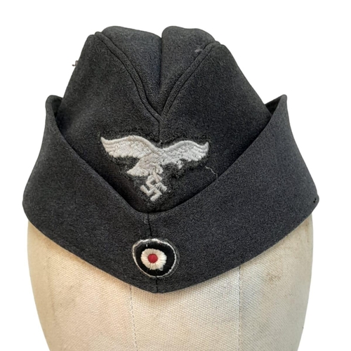 166 - WW2 German Luftwaffe Enlisted Mans/NCO’s Side Cap. The cap with embroidered roundel and Luftwaffe Ea... 