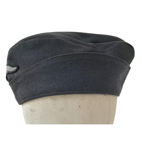 166 - WW2 German Luftwaffe Enlisted Mans/NCO’s Side Cap. The cap with embroidered roundel and Luftwaffe Ea... 