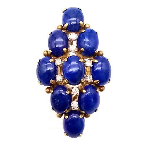 88 - A DESIGNER 18K GOLD RING WITH LAPIS LAZULI AND DIAMONDS .   10.4gms