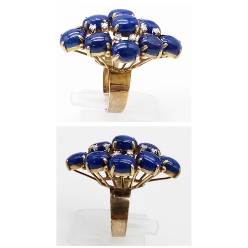 88 - A DESIGNER 18K GOLD RING WITH LAPIS LAZULI AND DIAMONDS .   10.4gms