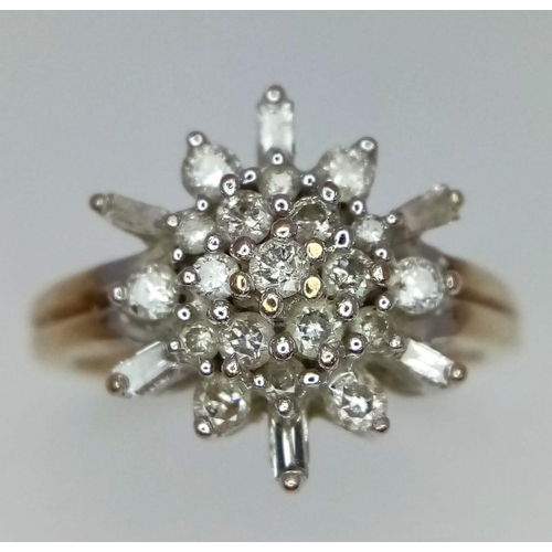 526 - 9k yellow gold diamond ring in star shape setting, size K 1/2, weight 3.2g (dia:0.65ct)