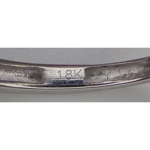 663 - 18k white gold diamond channel set half eternity ring, size L, weight 1.6g (dia:0.10ct)