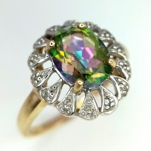 684 - 9k yellow gold diamond and mystic topaz ring, size P, 3g (dia:0.10ct/topaz:2.50ct)